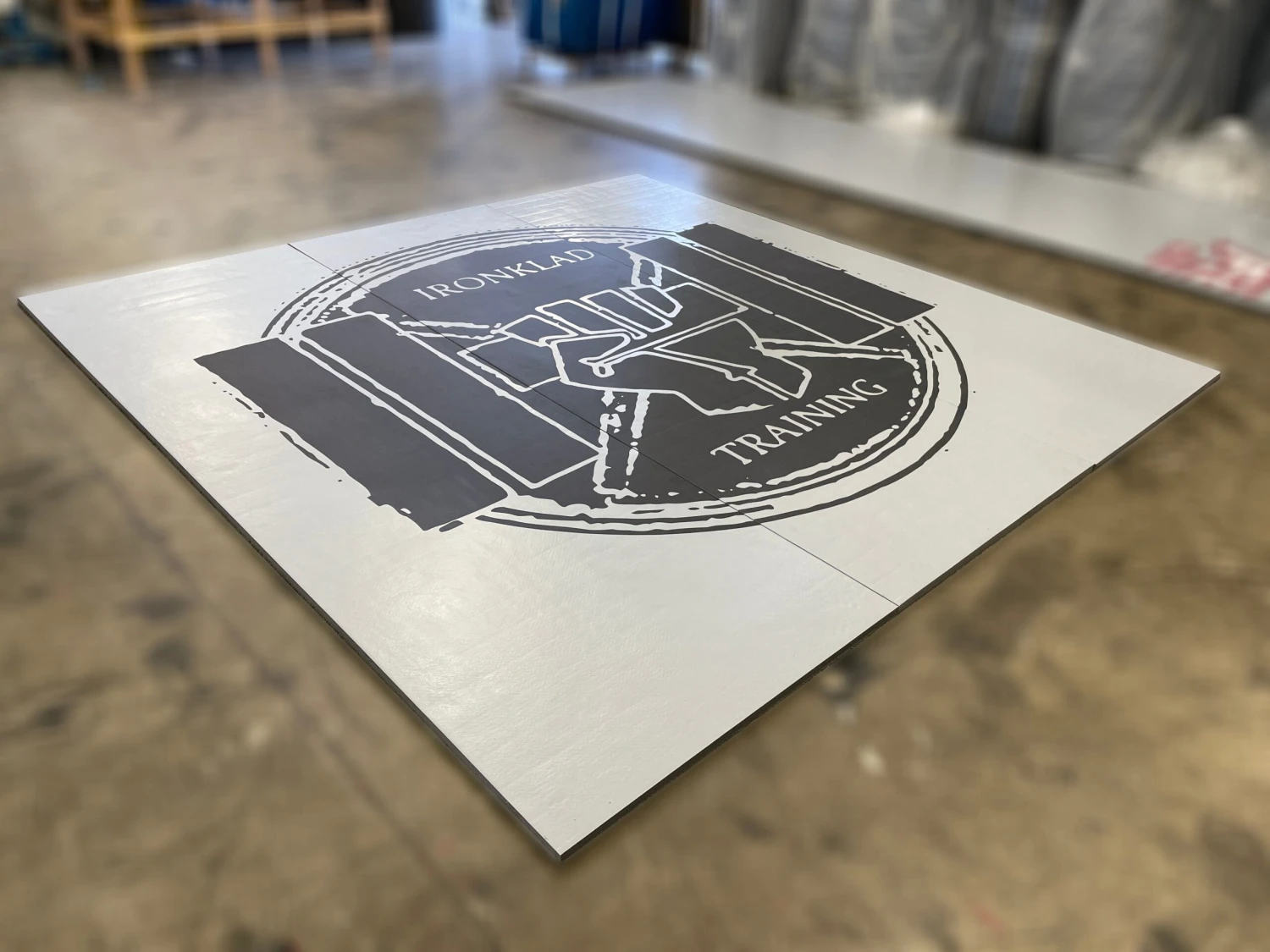 AK Athletic Equipment Clearance Wrestling Mat 12' X 12' X 1 3/8" Roll-Up Mat Gray Mat With Logo 1 AK Athletic Equipment Clearance Wrestling Mat 12' X 12' X 1 3/8" Roll-Up Mat Gray Mat With Logo