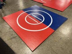 AK Athletic Equipment Clearance 8' X 8' X 1 3/8" Roll-Up Wrestling Mat Red And Blue With White Circles