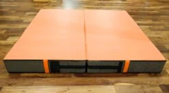 AK Athletic Equipment Aerial Arts Bi-Fold Landing Mat 6' X 6' X 8" -Wrestling Mat Shop orange aerial arts mat