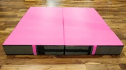 AK Athletic Equipment Aerial Arts Bi-Fold Landing Mat 6' X 6' X 8" -Wrestling Mat Shop pink aerial arts mat